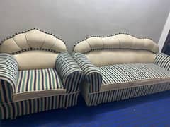 Skin sofa with blue and ferozi lines