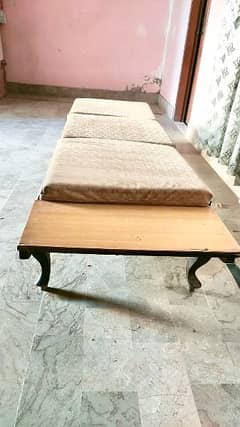Wooden Dewan with new Foam mattress and covers.
