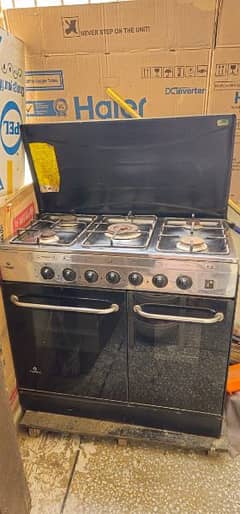 gas stove with oven and hotplate.