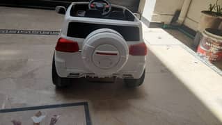 charging car for kids with remote all condition is good color is white