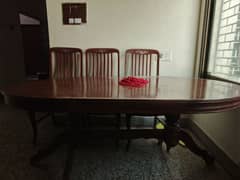 Dining table with 5 chairs sale good condition anyone want then inbox