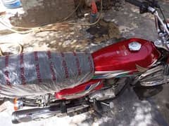 Honda 125 model 23 condition 10 by 10 all okay golden number 30 40