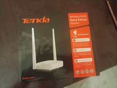 1 month used tenda router N301 with 20m wire in sialkot