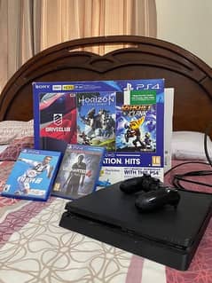 PlayStation 4 (PS4) Slim 500 GB with 1 controller and 2 Games