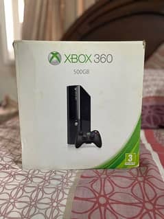 Xbox 360 500 GB with 2 controllers and 4 original games