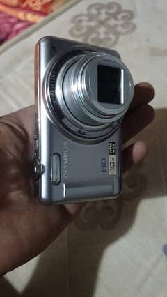 Olympus 14 mp hd camera and 1 sony handy cam
