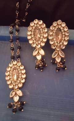 pendant with earrings