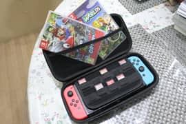 Nintendo Switch with all peripherals, Pro-Controller and 3 video games