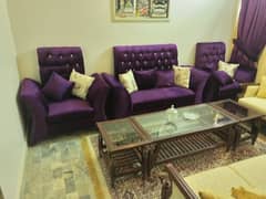 sofa set with tables carpet and curtens