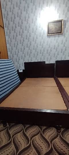 custom made single beds with 2 side tables