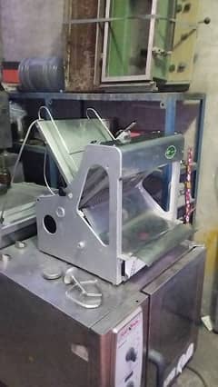 Bread cutter machine imported Korea 14 mm 220 voltage table top model