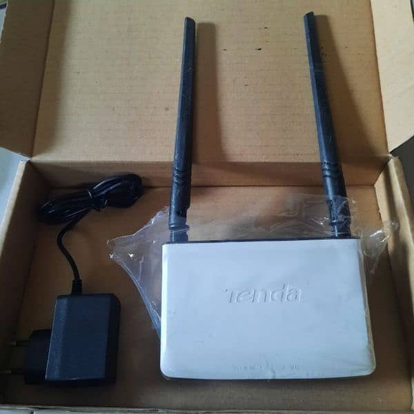 New Tenda Router|n300|tp link|Huawei|gpon|Contact me on 0326 4828053. 1