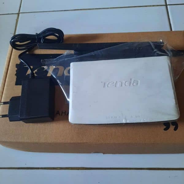 New Tenda Router|n300|tp link|Huawei|gpon|Contact me on 0326 4828053. 2