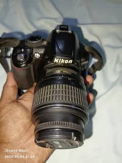 Nikon D3100 with kit lens 18-55mm
