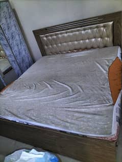 Bed with mattress and iron almari