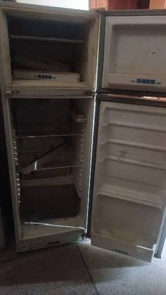 refrigerator for sale in good and running condition