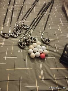 17 Irons, ,Woods, Putters etc and a caring bag