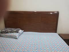 king size bed with side tables and dressing