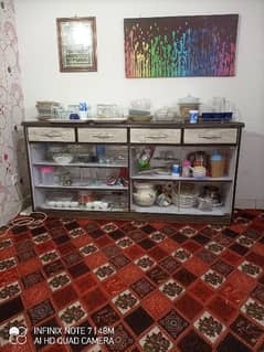A showcase with four drawers is for sale