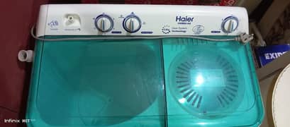New Haier washing machine with dryer . 2,3times used only