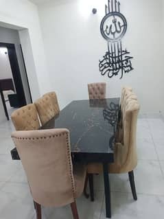 Very less used dinning table with 8 chairs