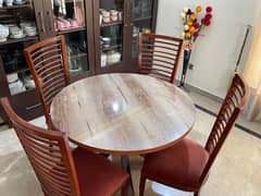 Gorgeous round wooden top dinning table with beautiful 4 chairs
