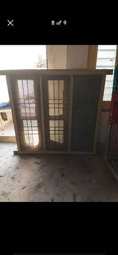 wood window and fixed airon Grill bohot mazboot window hai
