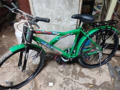full size cycle 10/10 condition green colour urgent sale