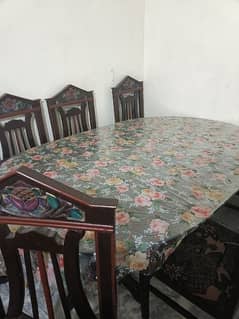 Dining table pure wood with 6 chairs very good condition brown color