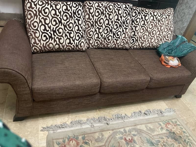 7 seater sofa slightly used 1