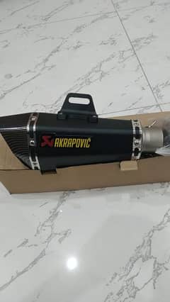 Akrapovic shark exhaust with "db killer" and "CARBON FIBER TIP"
