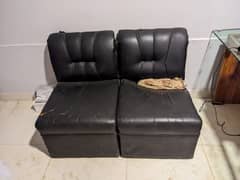 4 single seater sofa with wooden table.