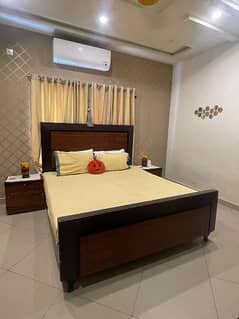 King size bed with 2 side tables.