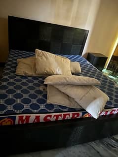 only few month used bed with side tables