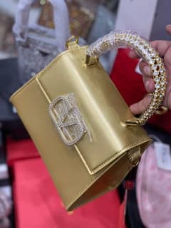 Valentino Gold color Hand Carry finest quality