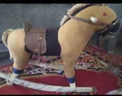 wooden horse (jhola)