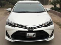 Toyota Altis Grande 2022 arrgent sale low mileage