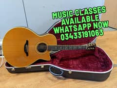 classic acoustic guitar with hard case music classes available karachi