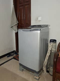 Haier fully automatic one touch washing machine for sale.