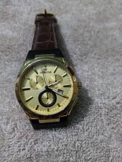 Gemstar
Golden watch for man