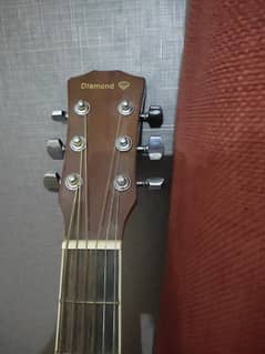 Diamond jumbo acoustic guitar