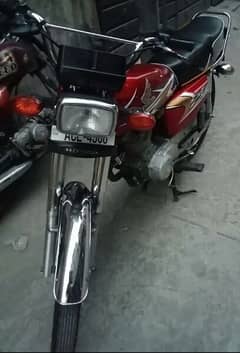 red Honda 125 condition 10/10 for sale