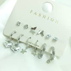 set of studs and earrings