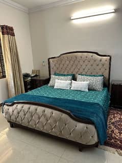 King size double bed with side tables and dressing table