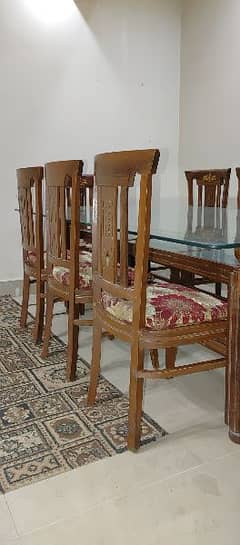 Dining table with 8 chairs good condition.