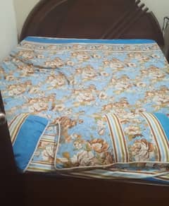 bed in good condition without matress with 2 side tables