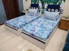 Twin beds with side drawer blue colour