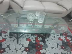 three glass tables in good condition