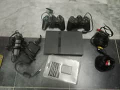 PlayStation 2 10/10 with all accessories