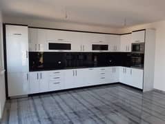 kitchen cabinet and granite marble